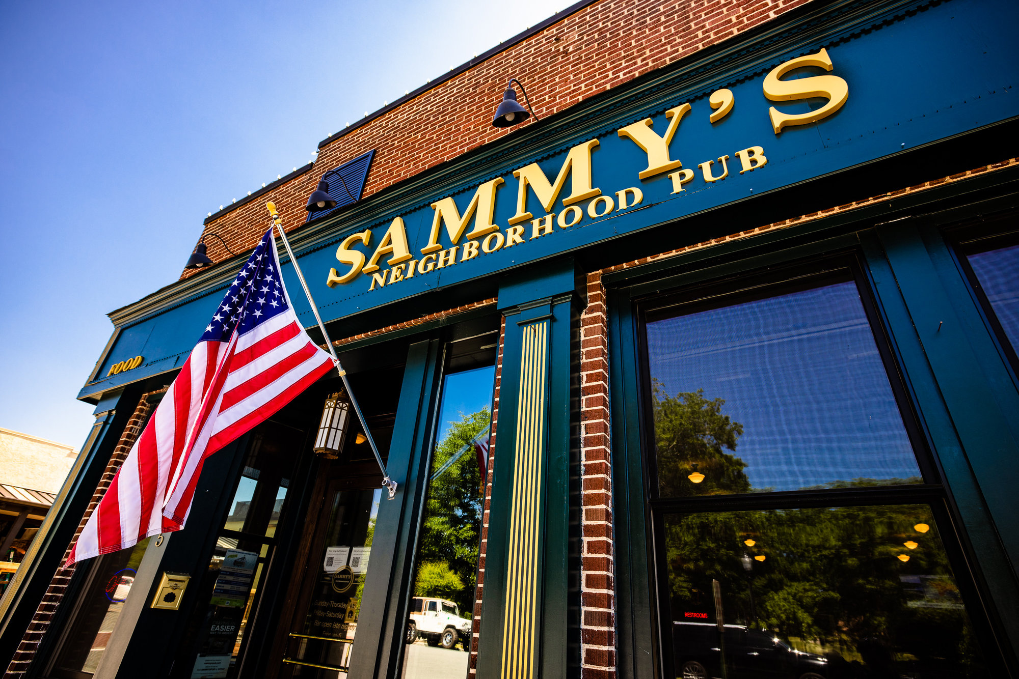Casual Belmont neighborhood pub serving build-your-own burgers
